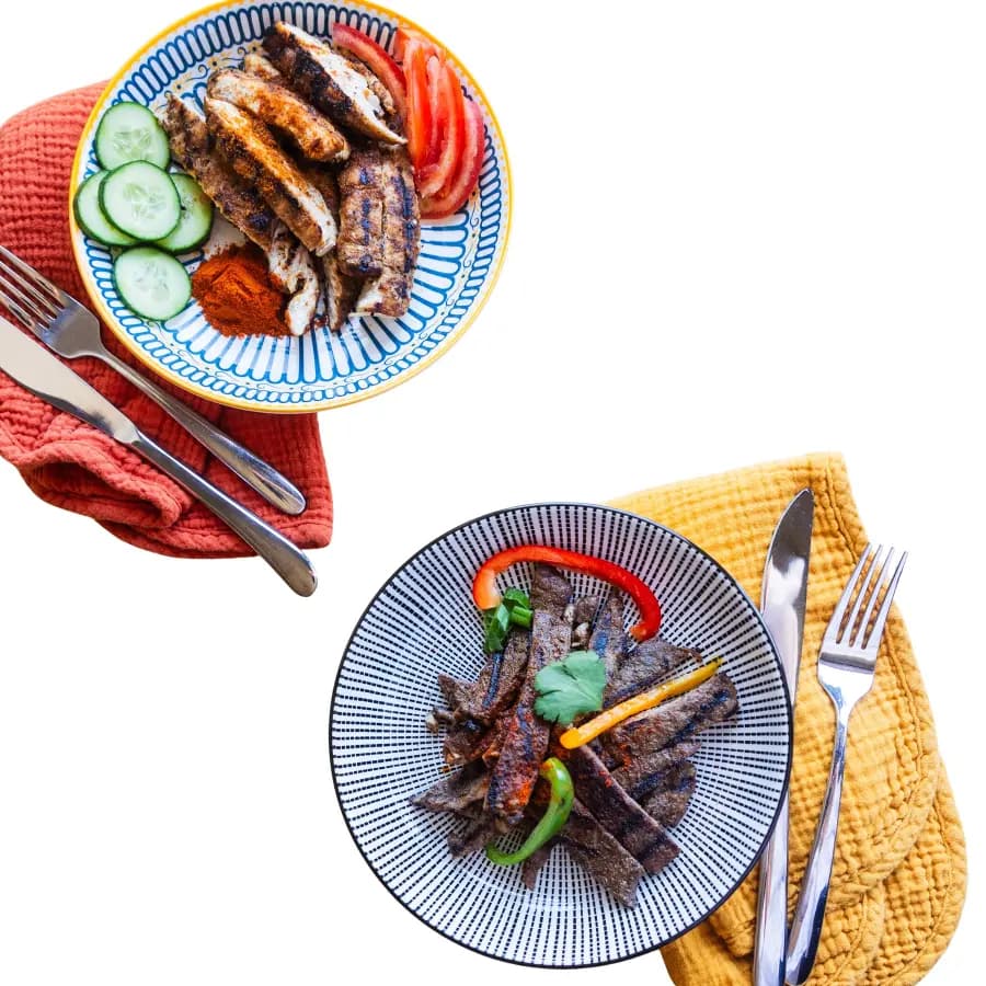 West African grilled chicken and beef suya plated for the table