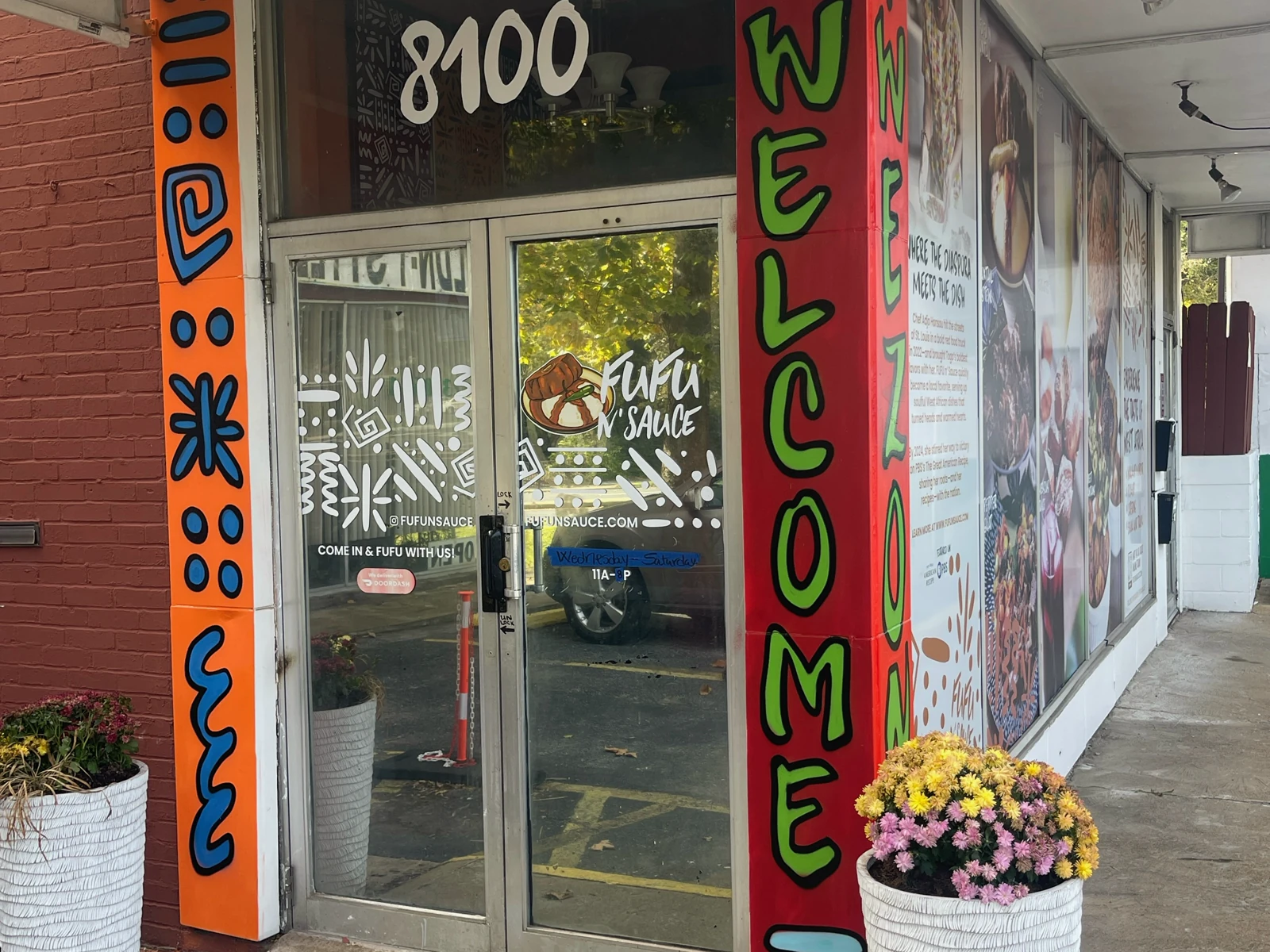 The colorful FUFU n' Sauce entrance at 8100 Page Avenue